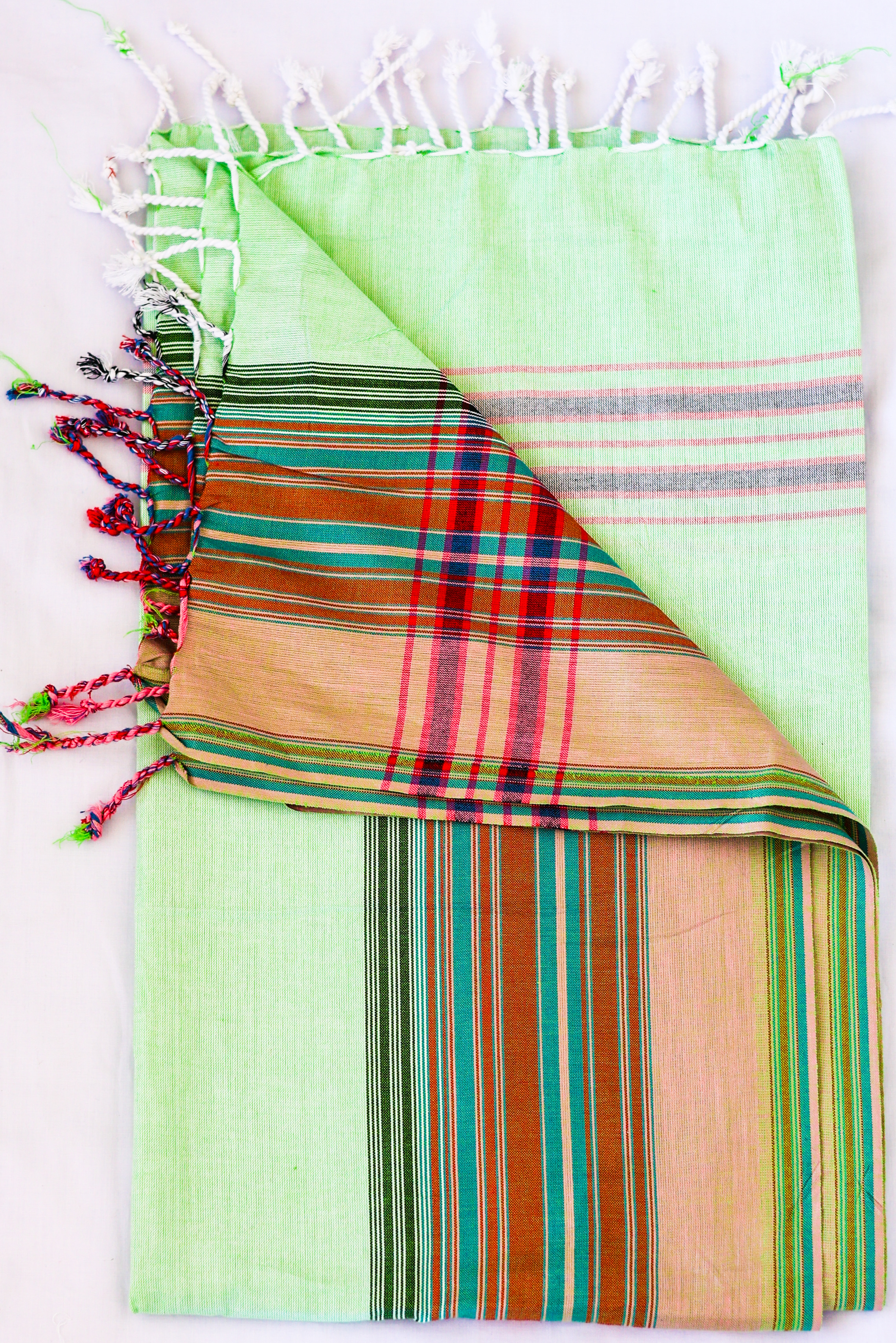 Lime Green Kikoy with rust and teal plaid reverse