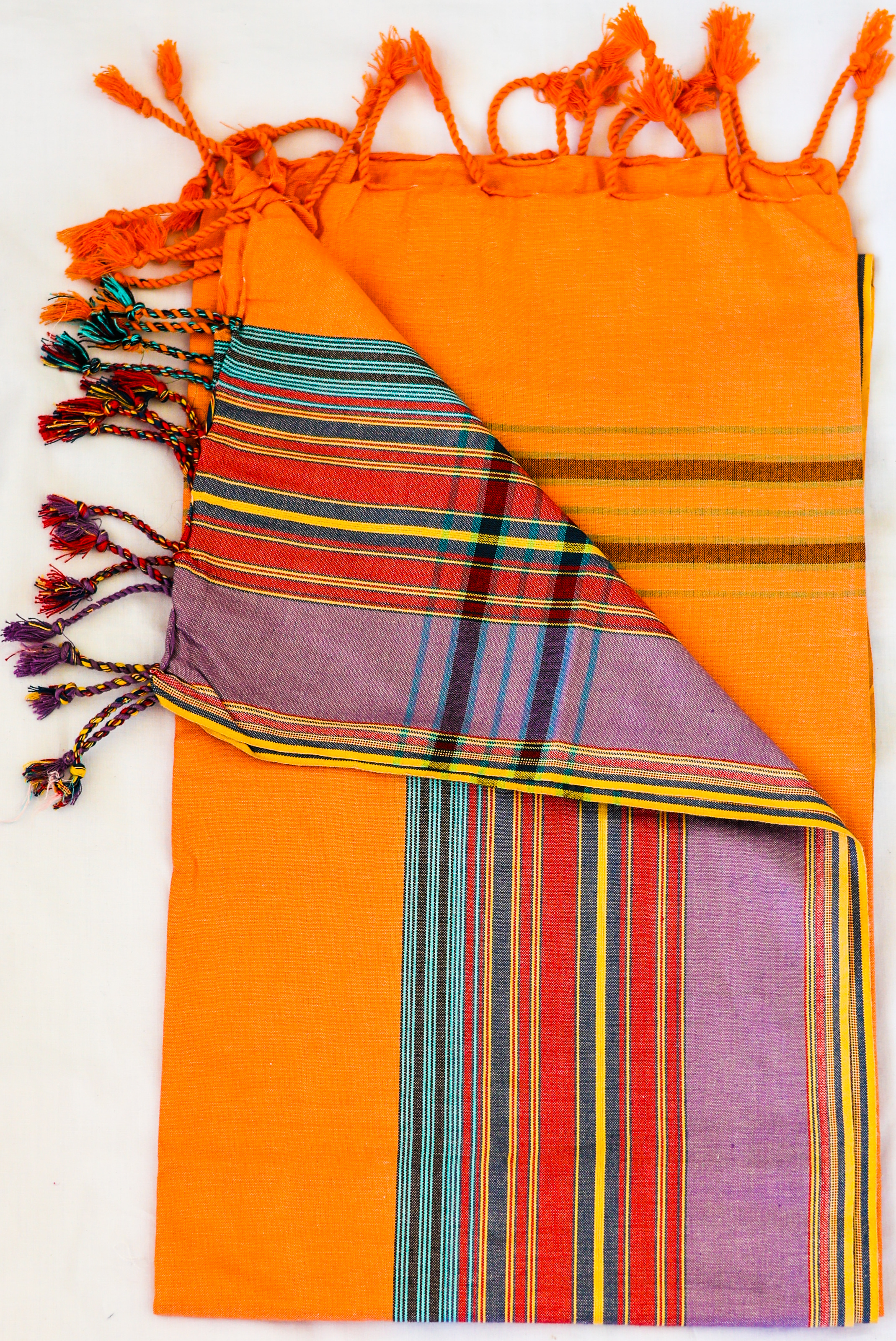 Sunset Orange Kikoy with purple and red plaid reverse